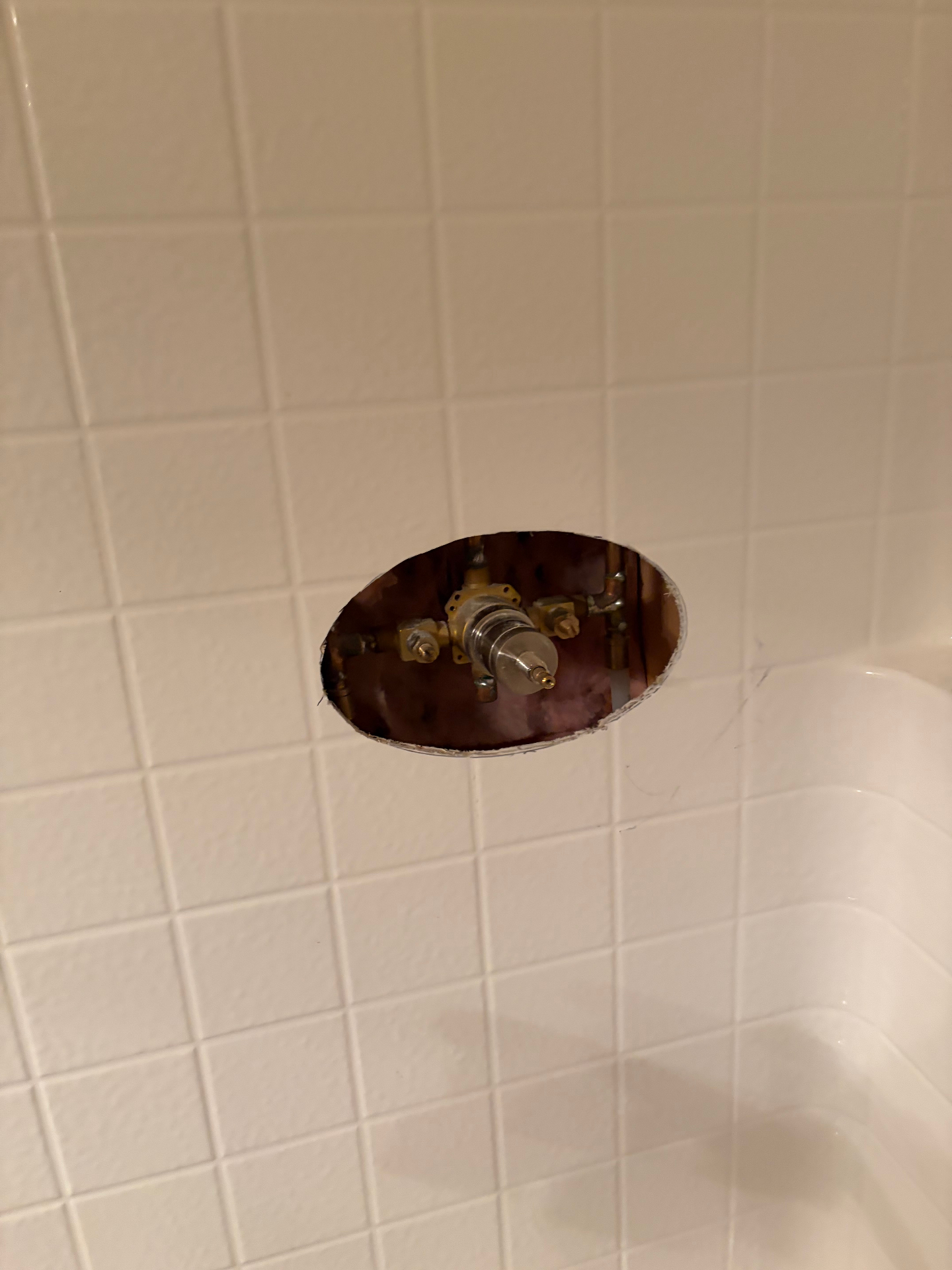 Shower valve replacement in progress